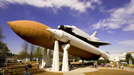 A space shuttle, external tank and two rocket boosters on display at the U.S. Space & Rocket Center