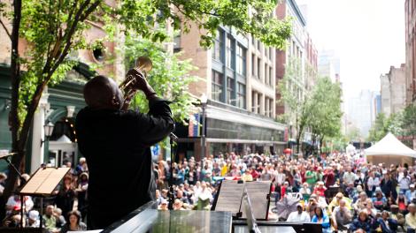 A jazz musician playing at the Pittsburgh International Jazz Festival in Pennsylvania A jazz musician playing at the Pittsburgh International Jazz Festival in Pennsylvania