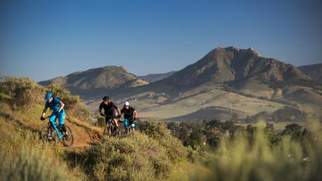 Mountain biking on trails through the hills
