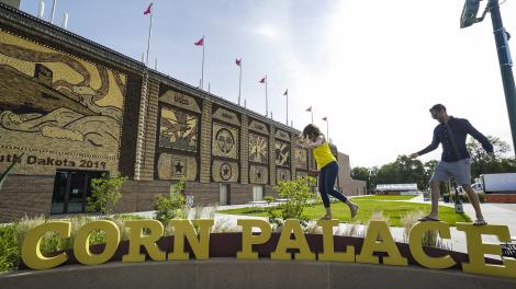 Posing outside the Corn Palace in Mitchell, South Dakota