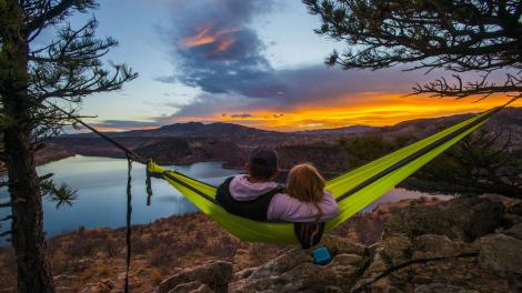 Watching a colorful sunset from a hammock overlooking Horsetooth Reservoir