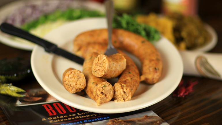 In ihrer Reinform besteht die würzige Boudin aus Fleisch, Reis, Zwiebeln, Paprika und Gewürzen.