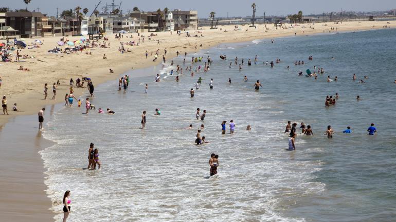 Head to Alamitos Beach to mingle on the sand and at bars nearby.