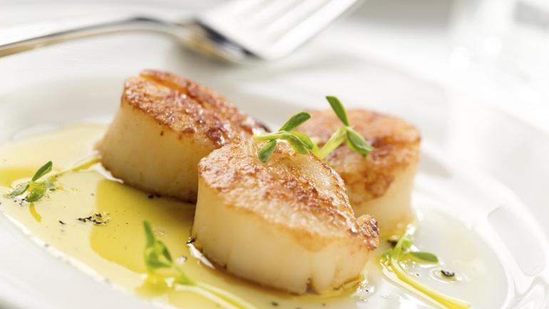 Fresh-caught scallops prepared by a local restaurant