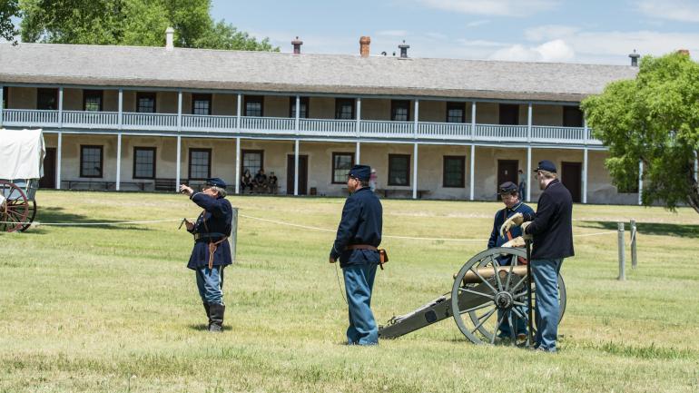 A reenactment of a cannon firing at Fort Laramie National Historic Site in Wyoming