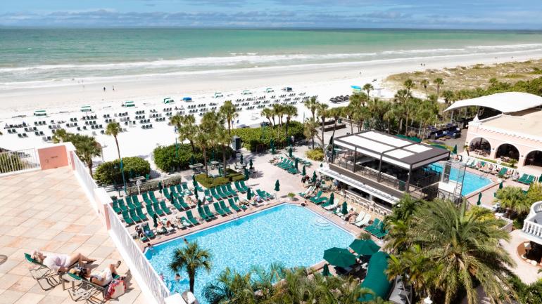 Lounging on the luxurious pool deck of The Don Cesar in St. Petersburg, Florida