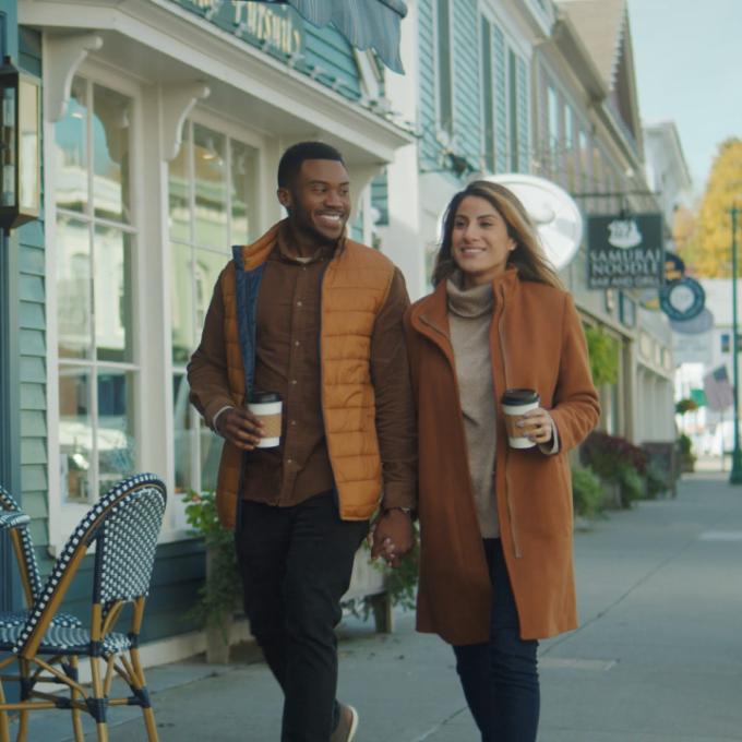 Couple exploring a quaint town in Connecticut Couple exploring a quaint town in Connecticut