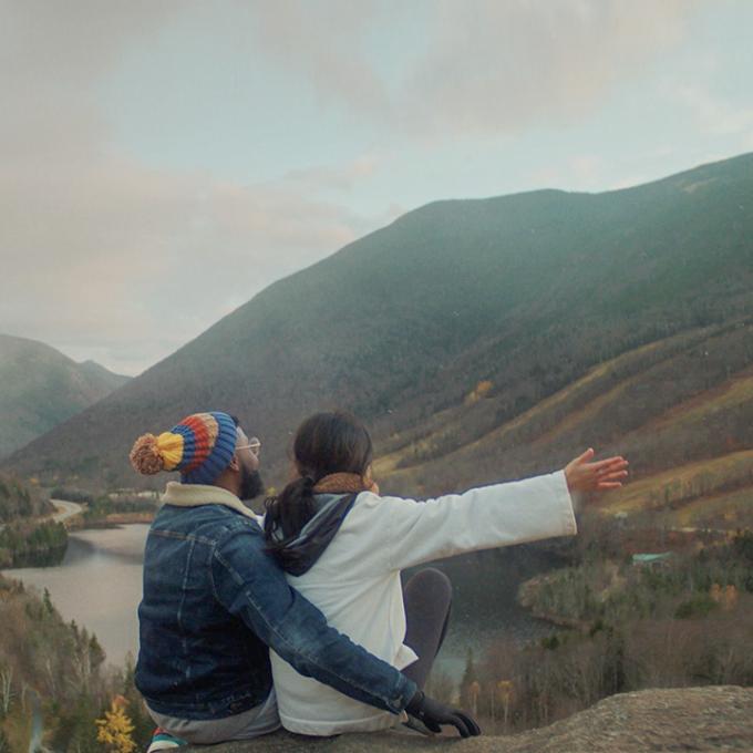 Couple appreciating the views in the White Mountains of New Hampshire Couple appreciating the views in the White Mountains of New Hampshire
