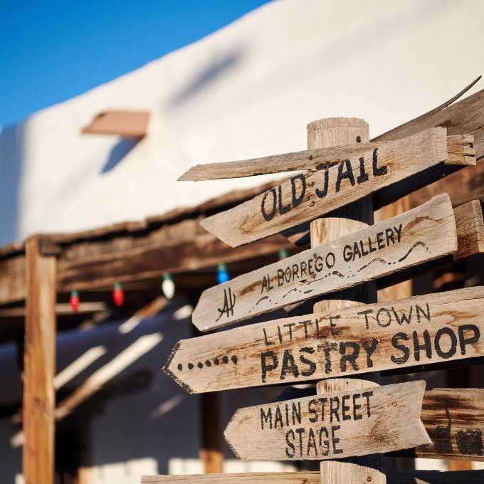 Signs pointing to sites in the San Elizario historic district near El Paso, Texas