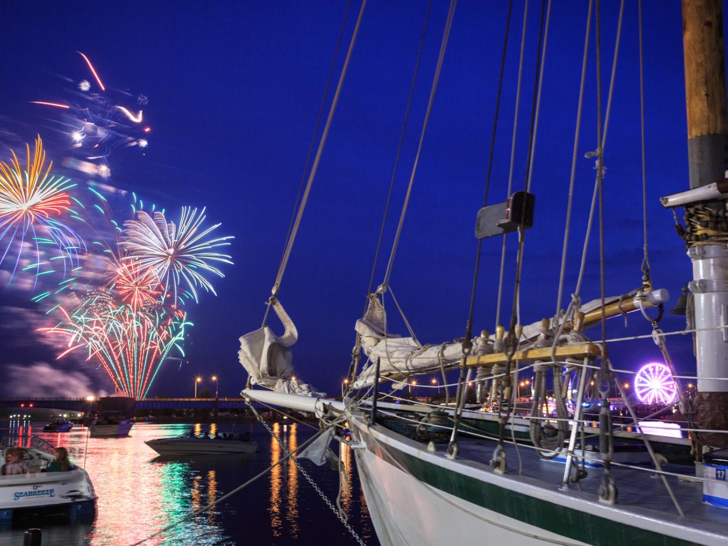 Fireworks illuminating the Bay City sky and waters
