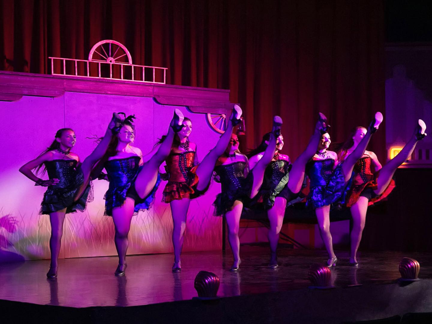 Dancers on stage at Buffalo Bill's Wild West Spectacular in Cody