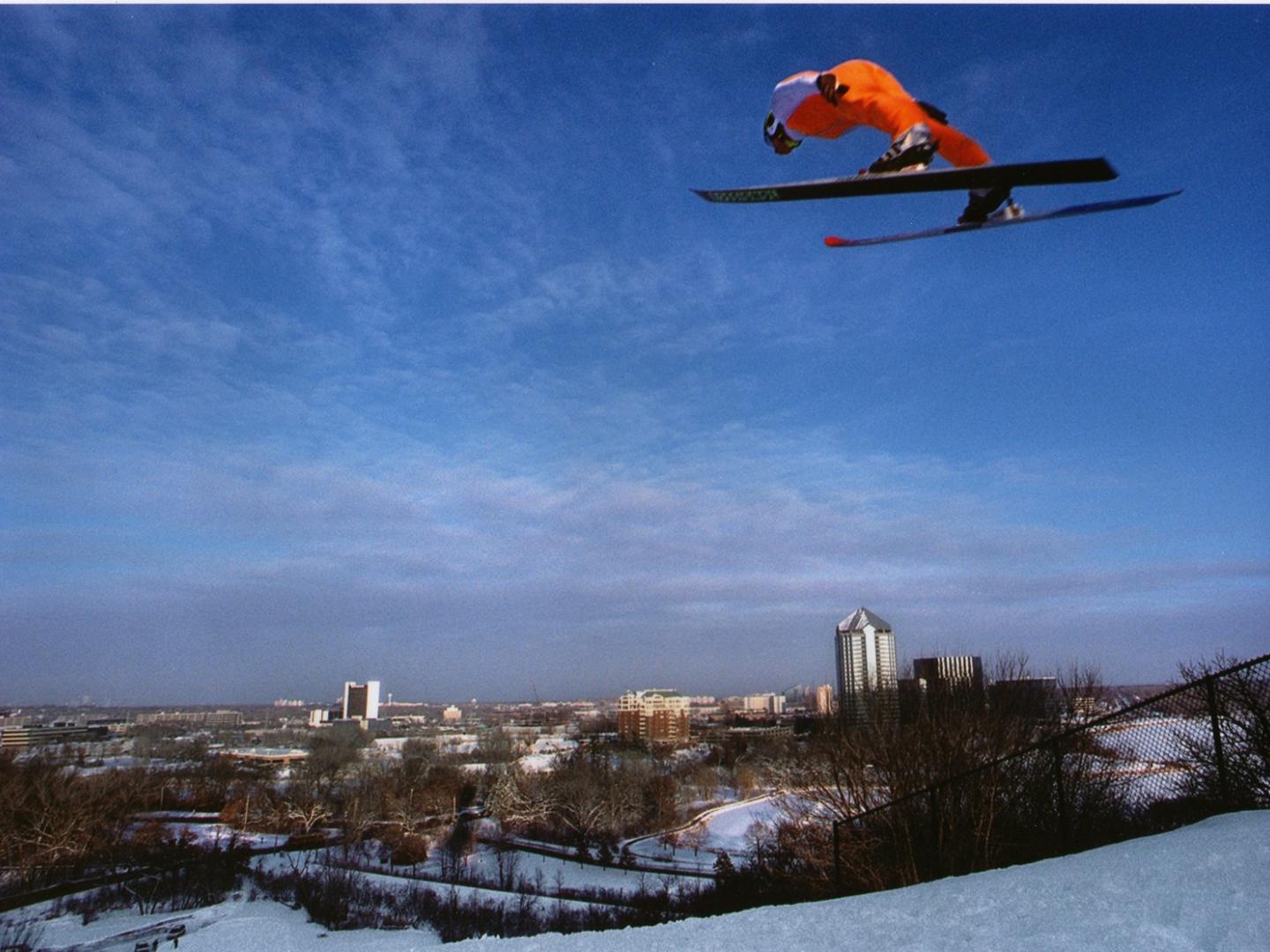 Soaring through the sky at Bush Lake Ski Jump