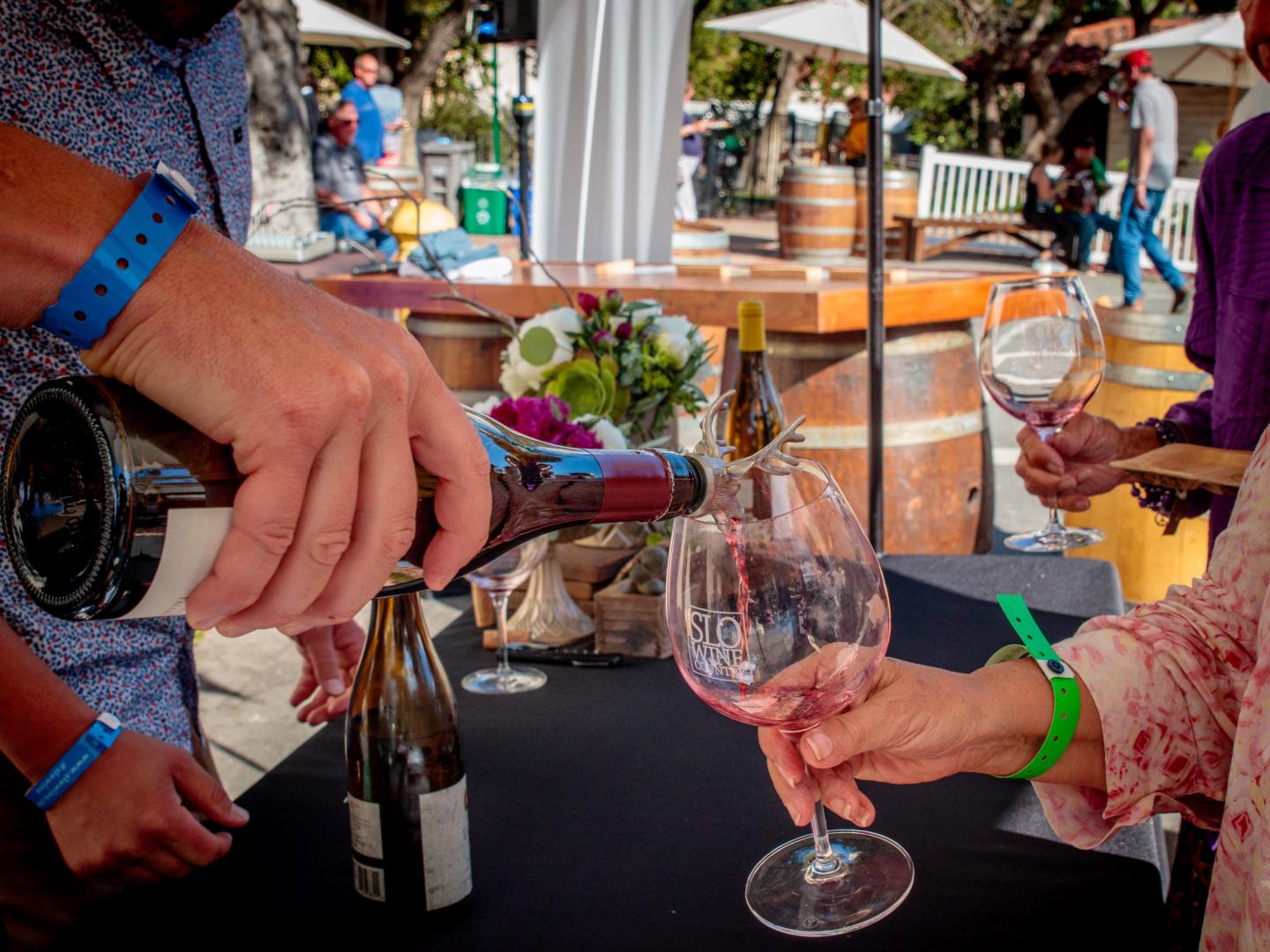 Sampling California wines during the Roll Out the Barrels event in San Luis Obispo