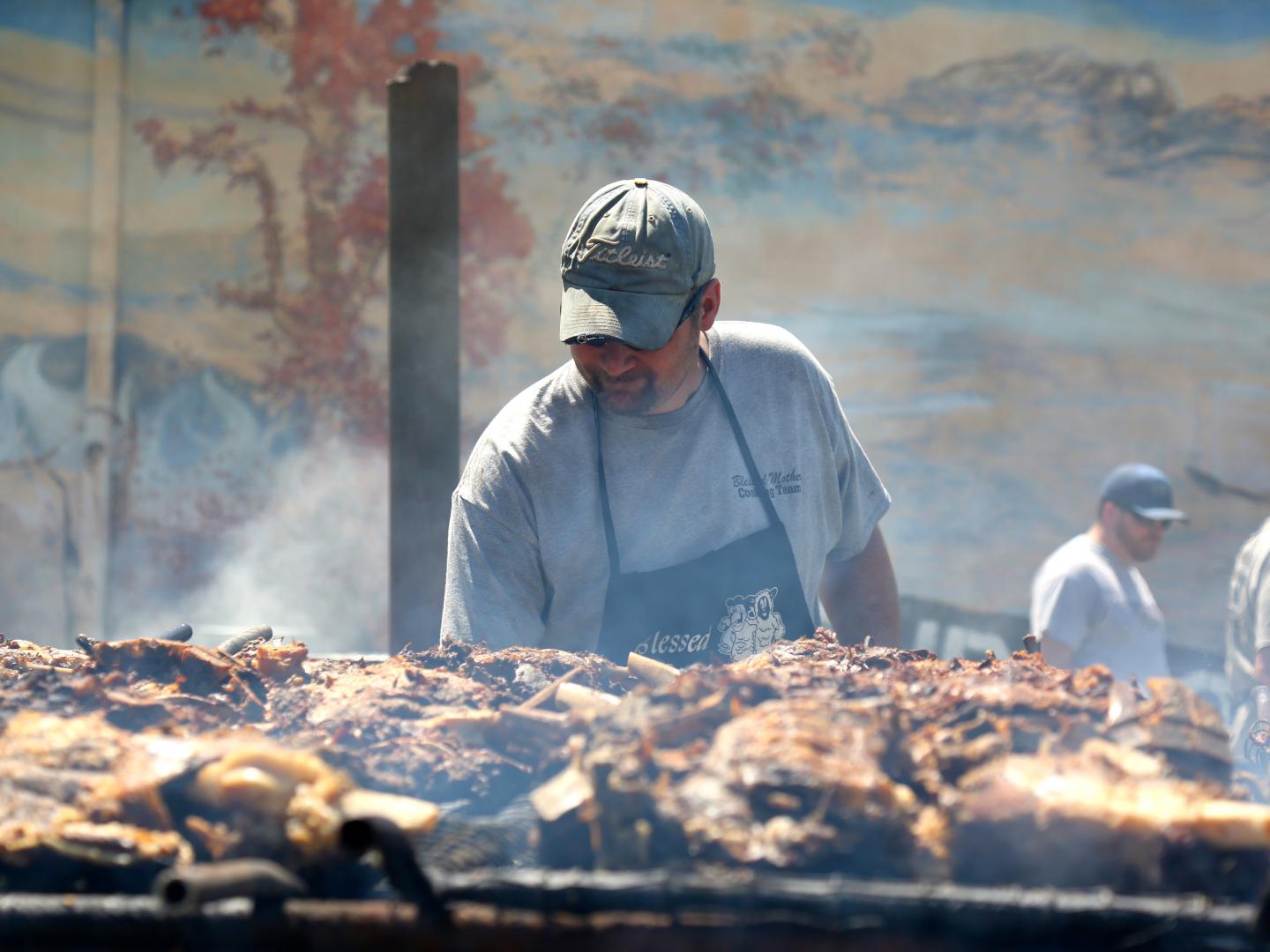 Cooking up some barbecued meats at the International BBQ Festival in Owensboro, Kentucky