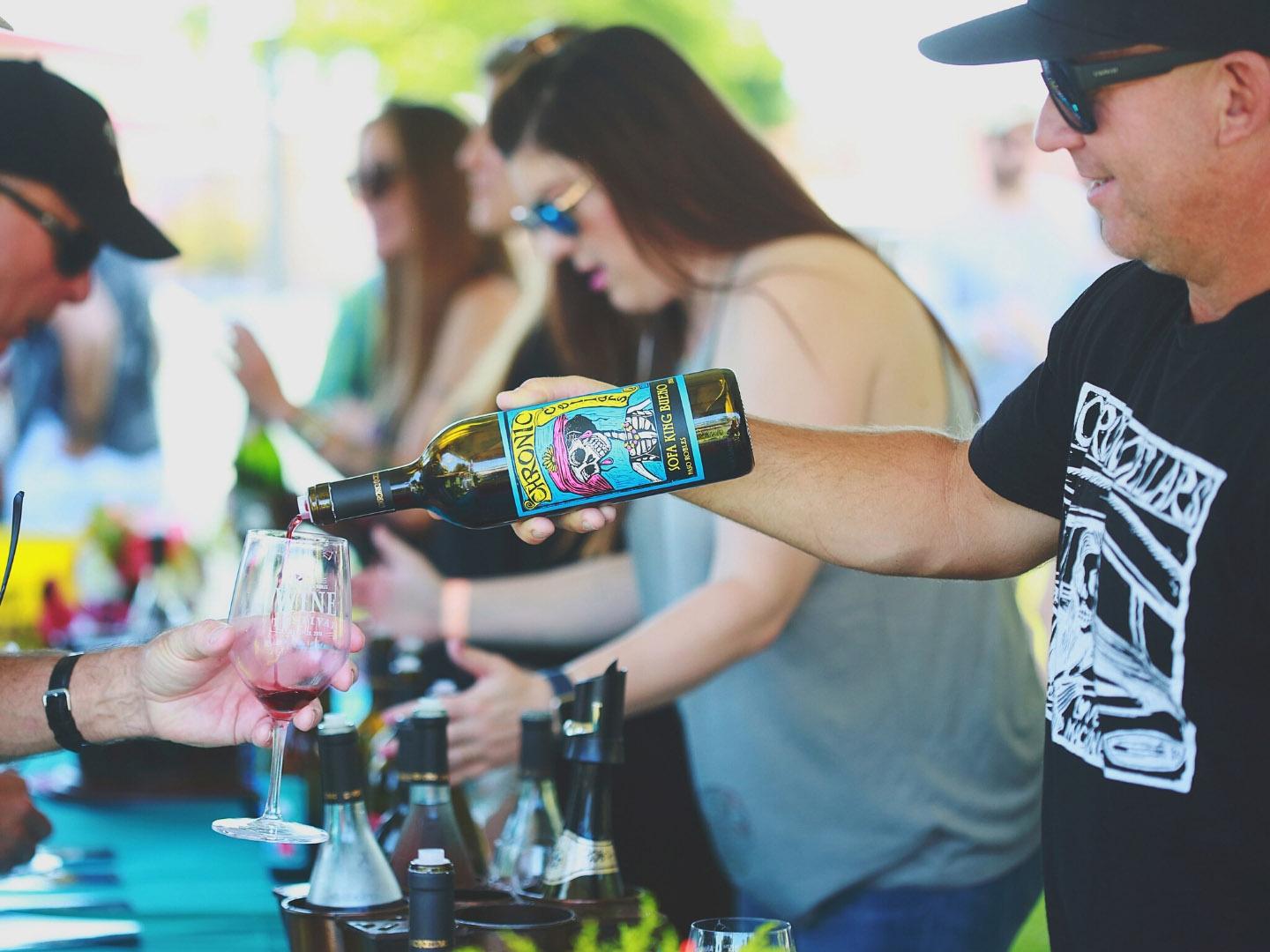 Pouring wine samples during Wine Festival Weekend in Paso Robles, California