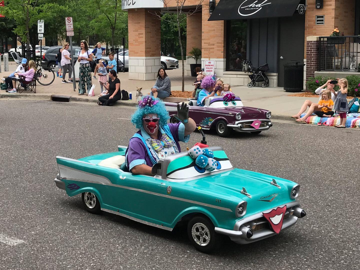 St. Louis Park Parktacular ambassadors riding a float in the event's parade