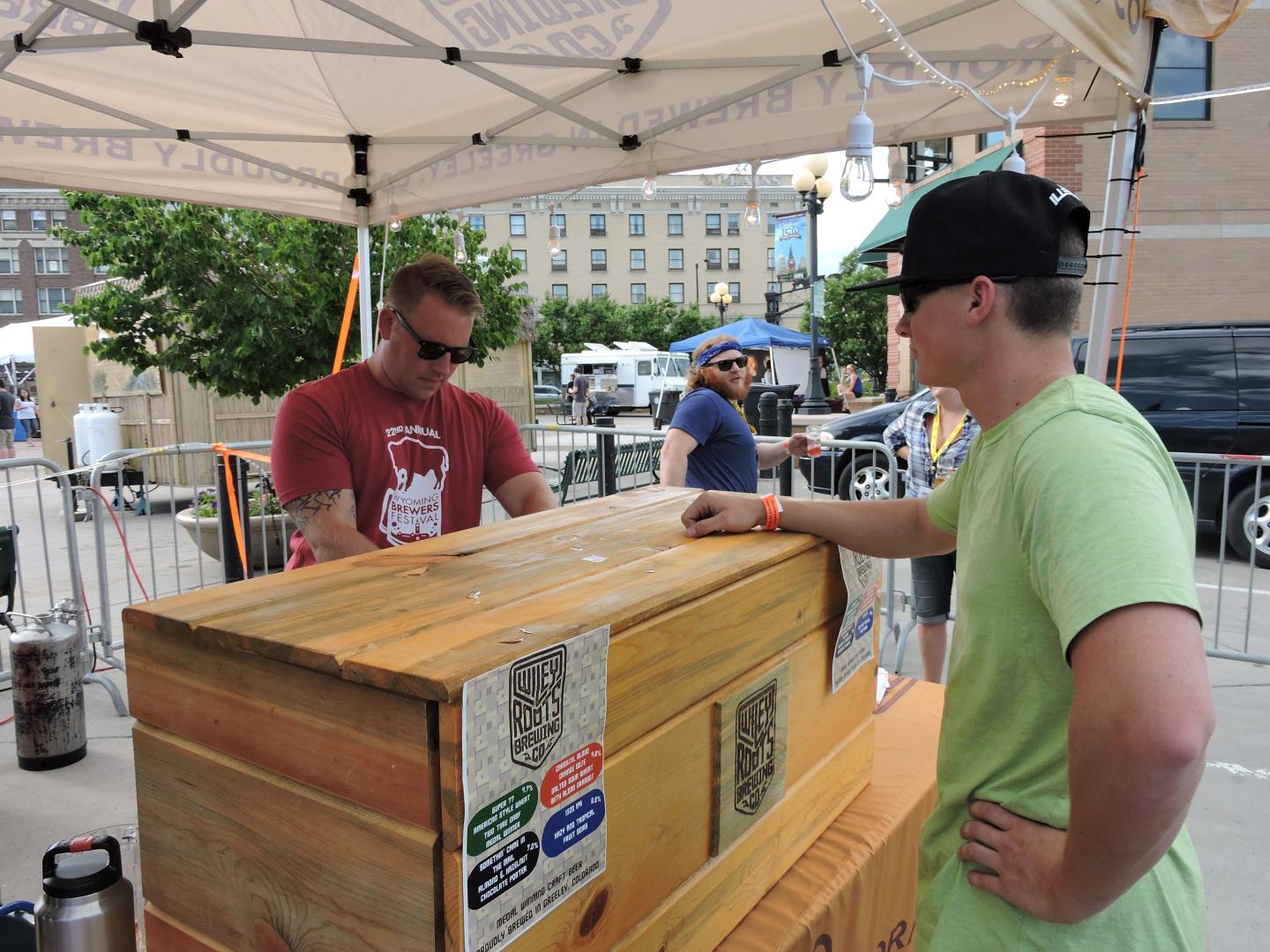 Patron getting a beer sample during Wyoming Brewers Festival in Cheyenne