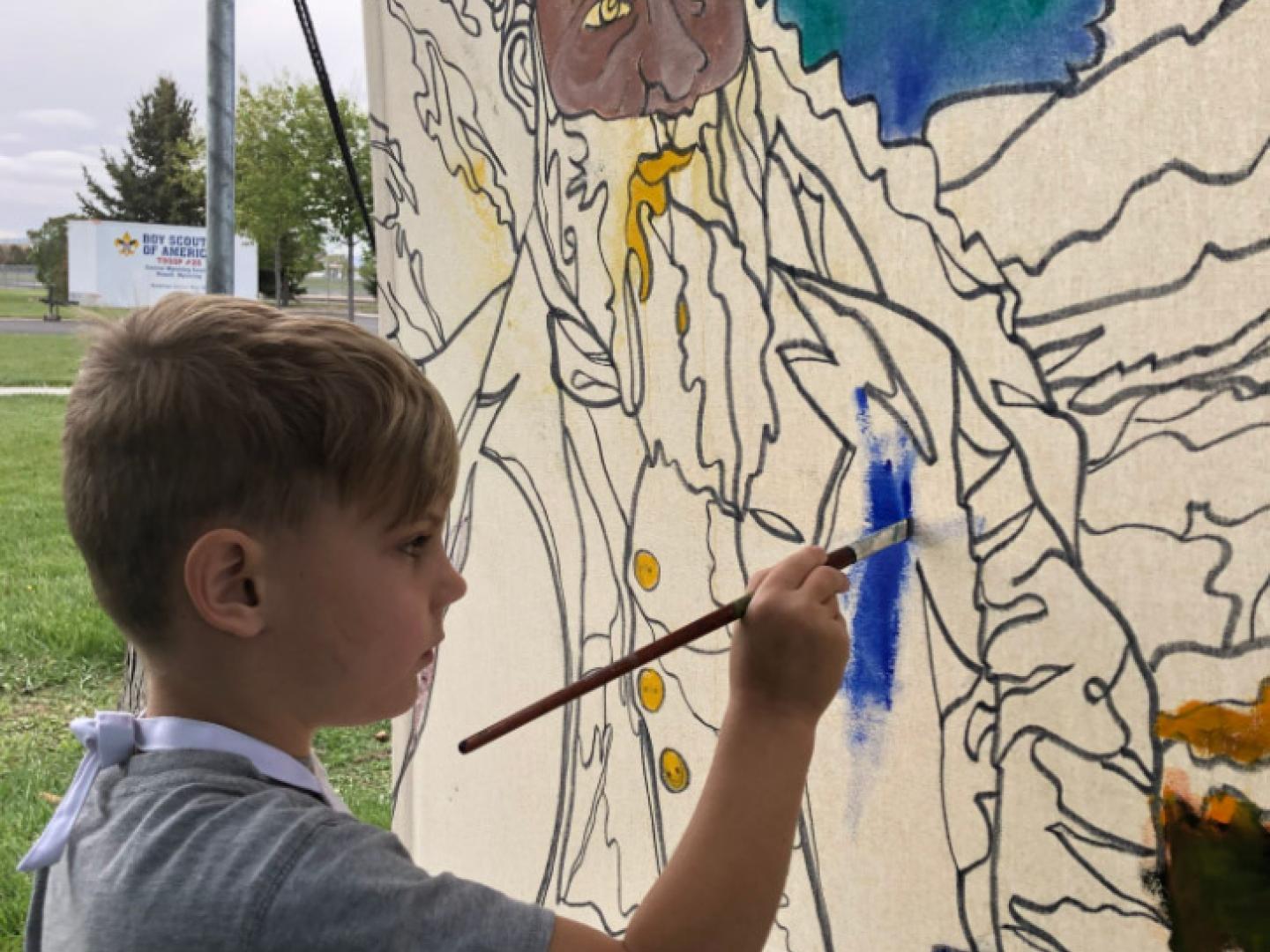 Interactive painting fun for kids at the John Wesley Powell Festival in Wyoming