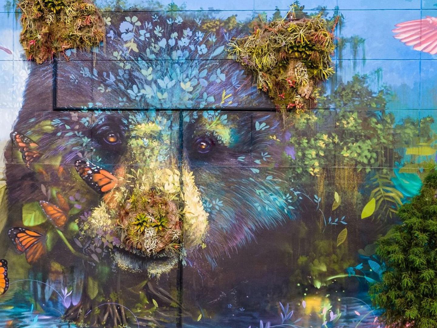 Colorful bear mural at the First Friday Art Walk in Ocala, Florida