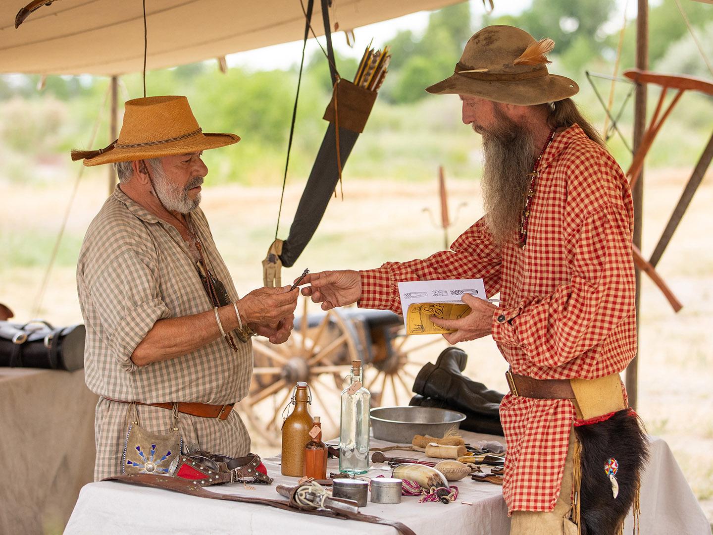 Reenactors participate in the 1838 Mountain Man Rendezvous in Riverton, Wyoming 