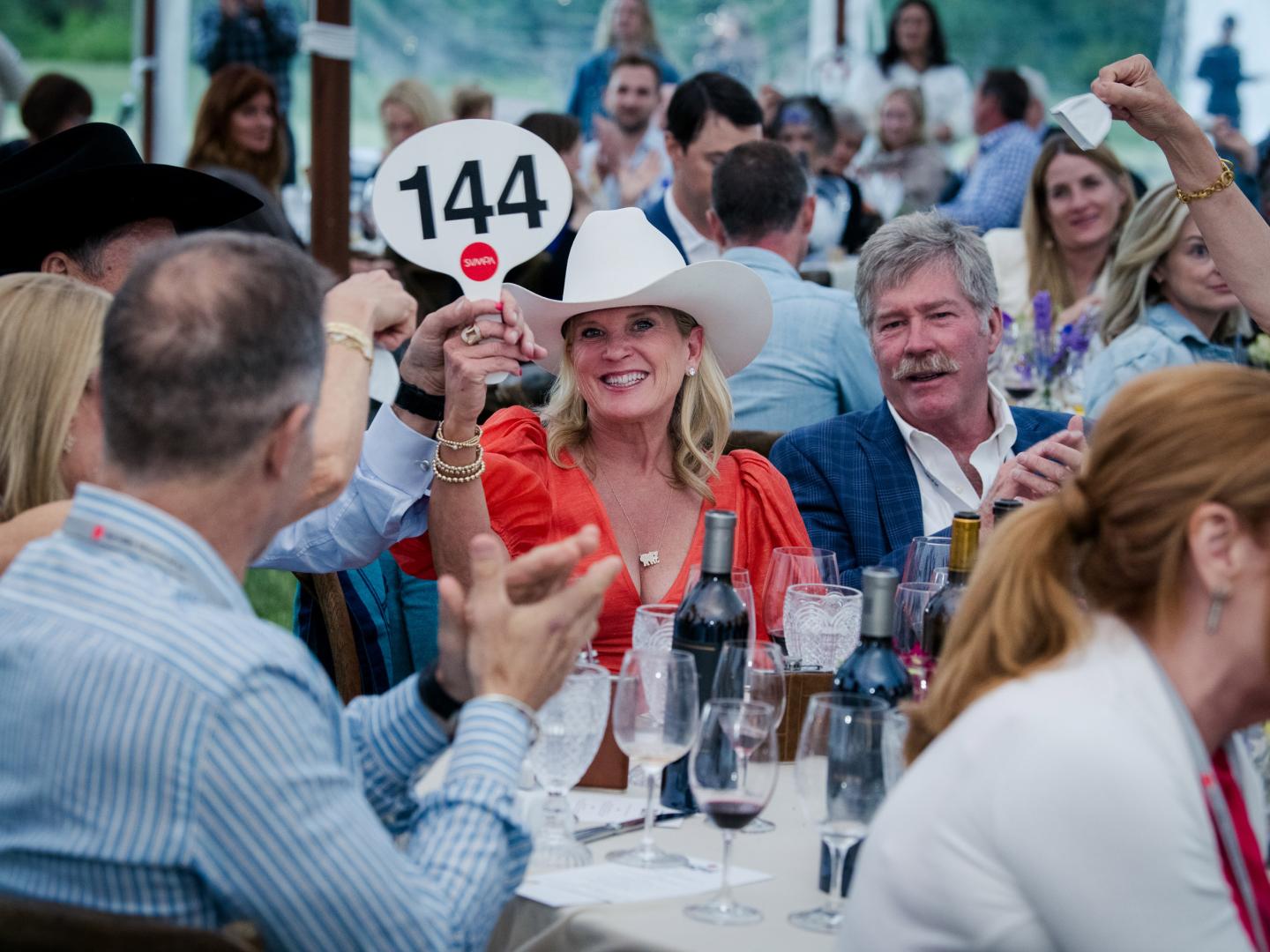 Placing bids at the annual Sun Valley Wine Auction in Ketchum, Idaho