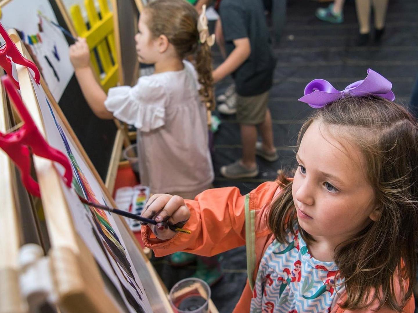 Children painting during the Crosstie Arts & Jazz Festival in Cleveland, Mississippi