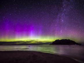 The aurora borealis, or northern lights, glowing over Little Presque Isle 