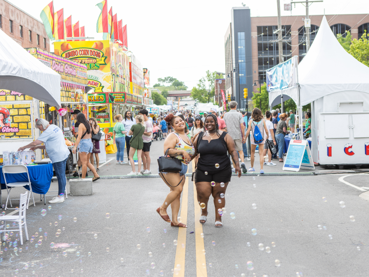Enjoying vendors and festivities at Tulsa International Mayfest in Tulsa, Oklahoma