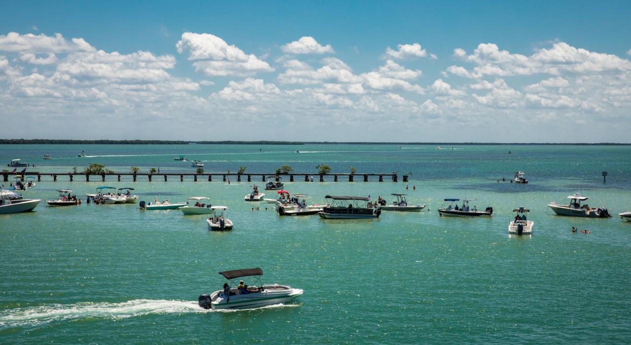 Boaters docked for a chill day on the sandbar at North Gasparilla Island