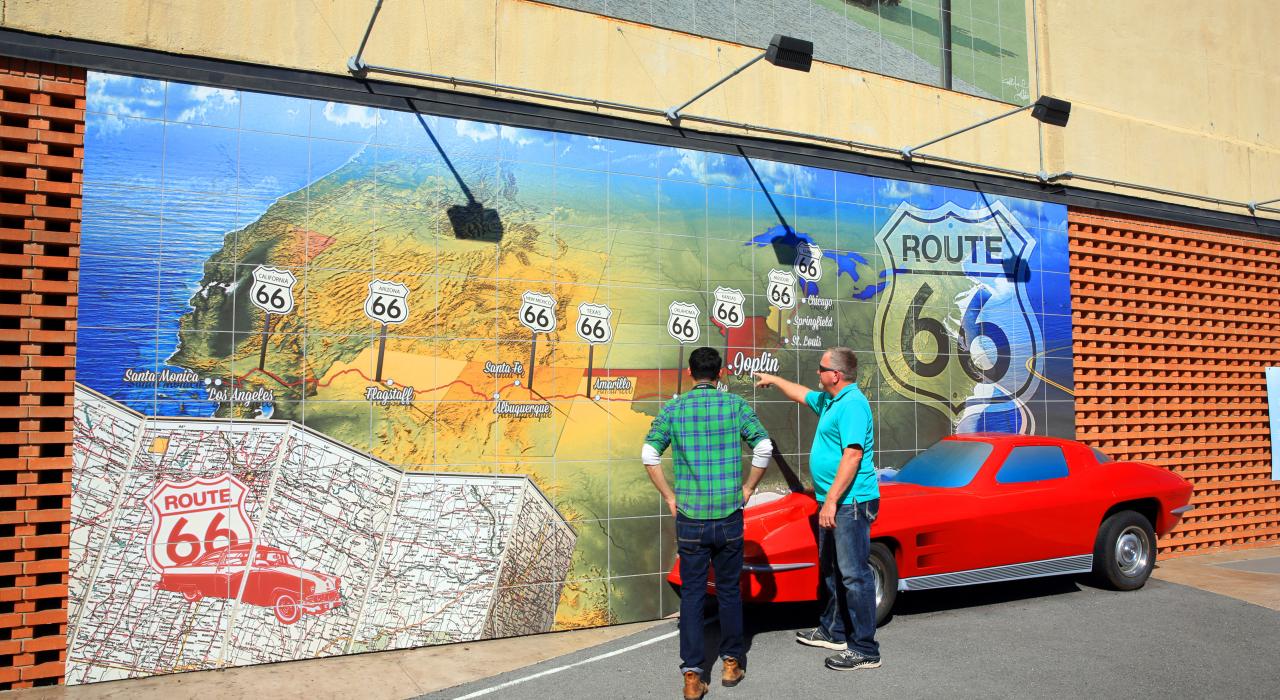 Admiring a Route 66 mural in Joplin, Missouri