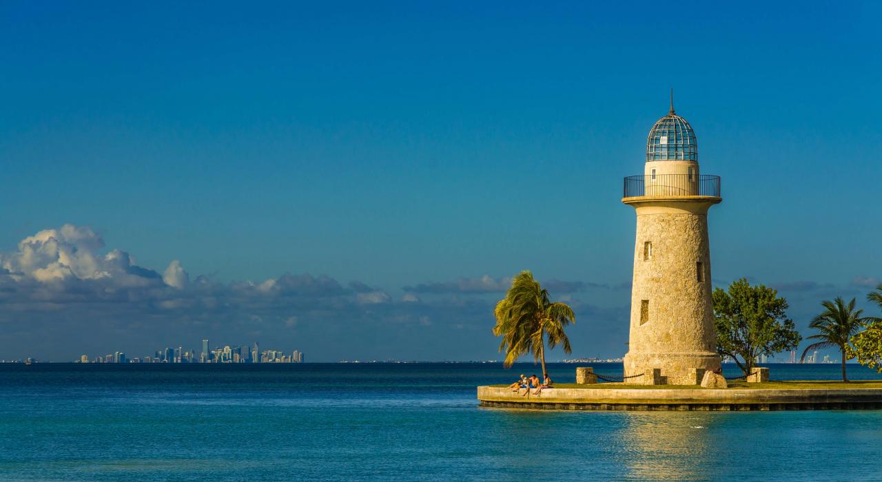 From the Boca Chita Lighthouse, see the Miami skyline across Biscayne Bay