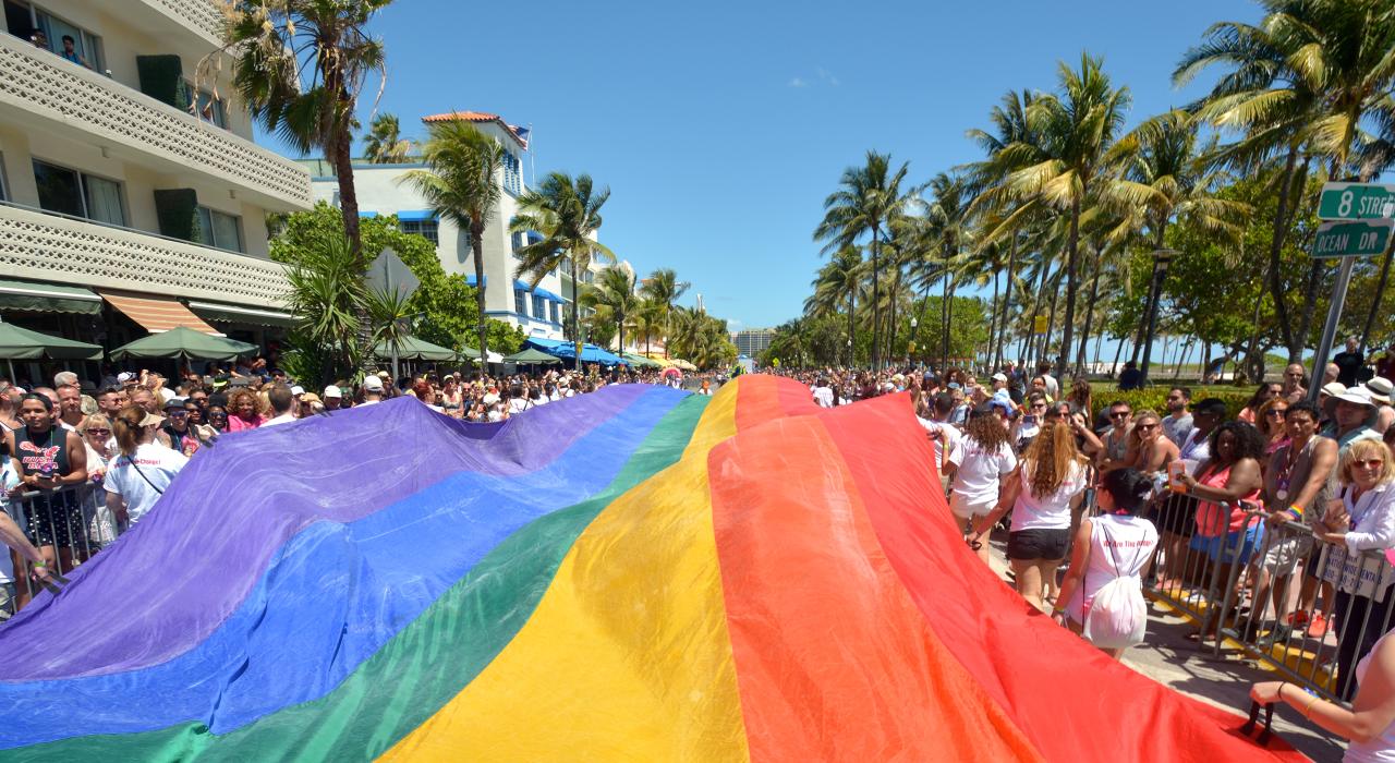 A massive rainbow flag during a Miami Beach, Florida, Pride event