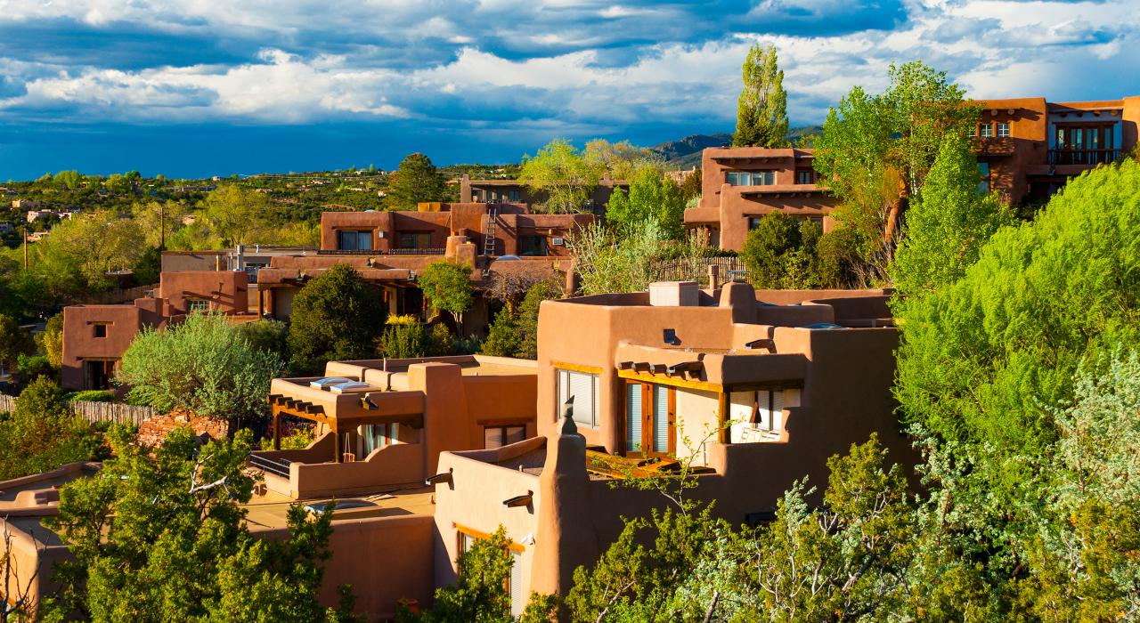 Hillside houses with traditional pueblo architecture 