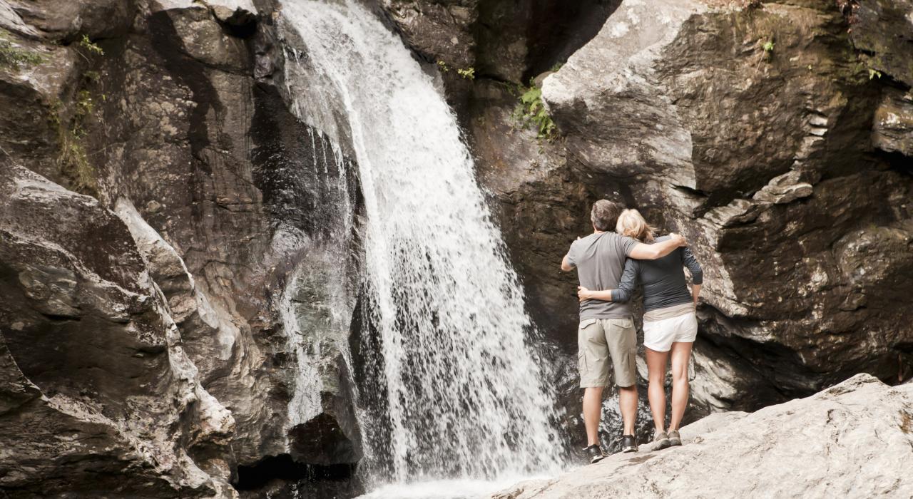 A cascading waterfall in the mountains