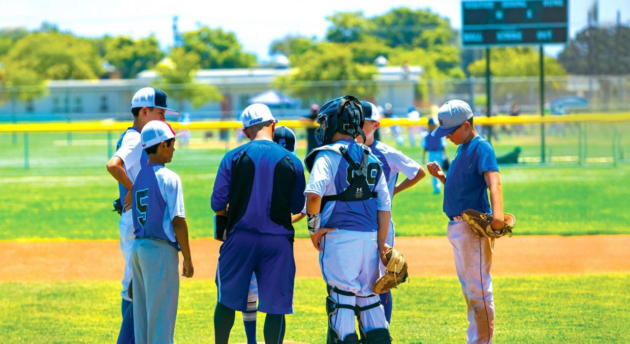 Match de baseball, le loisir préféré des Américains, dans un parc de la ville