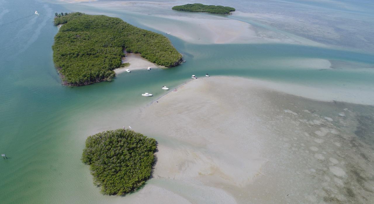 Boaters enjoying the day on the pristine, secluded Stuart Sandbar