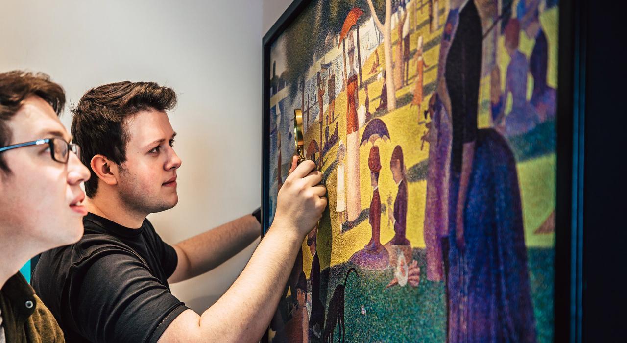 Examining a clue at Mall of America's Escape Game attraction