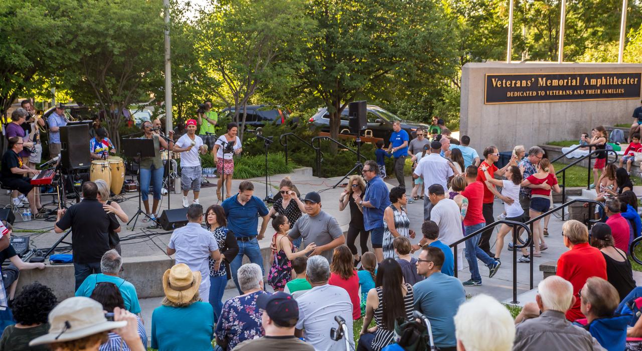 Dancing at a summer concert at the Veterans Memorial Amphitheater