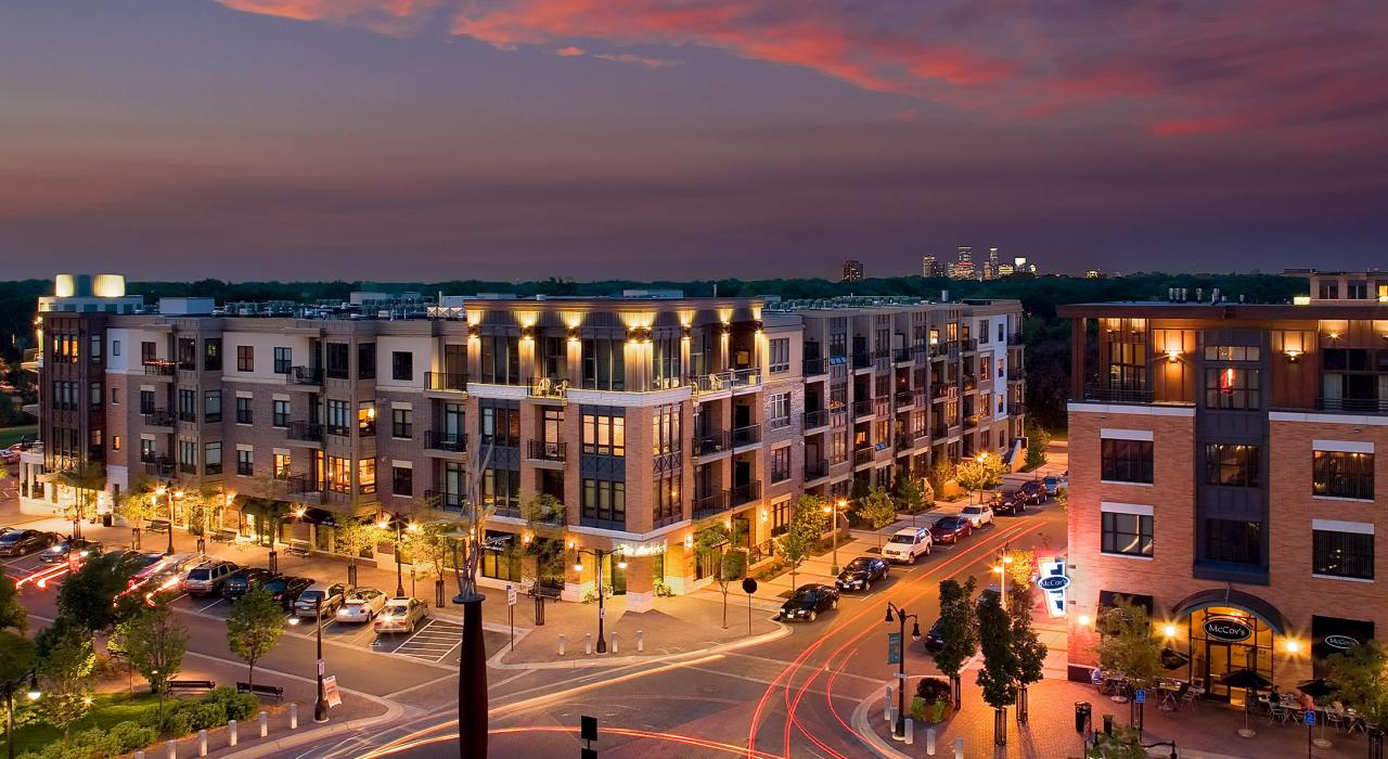 Excelsior and Grand luxury apartments with the Minneapolis skyline in the background