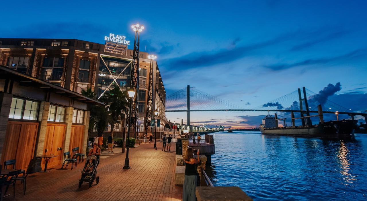 Night falls over the Plant Riverside District, a lively entertainment hub in Savannah